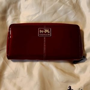 Coach burgundy red patent leather long wallet.
